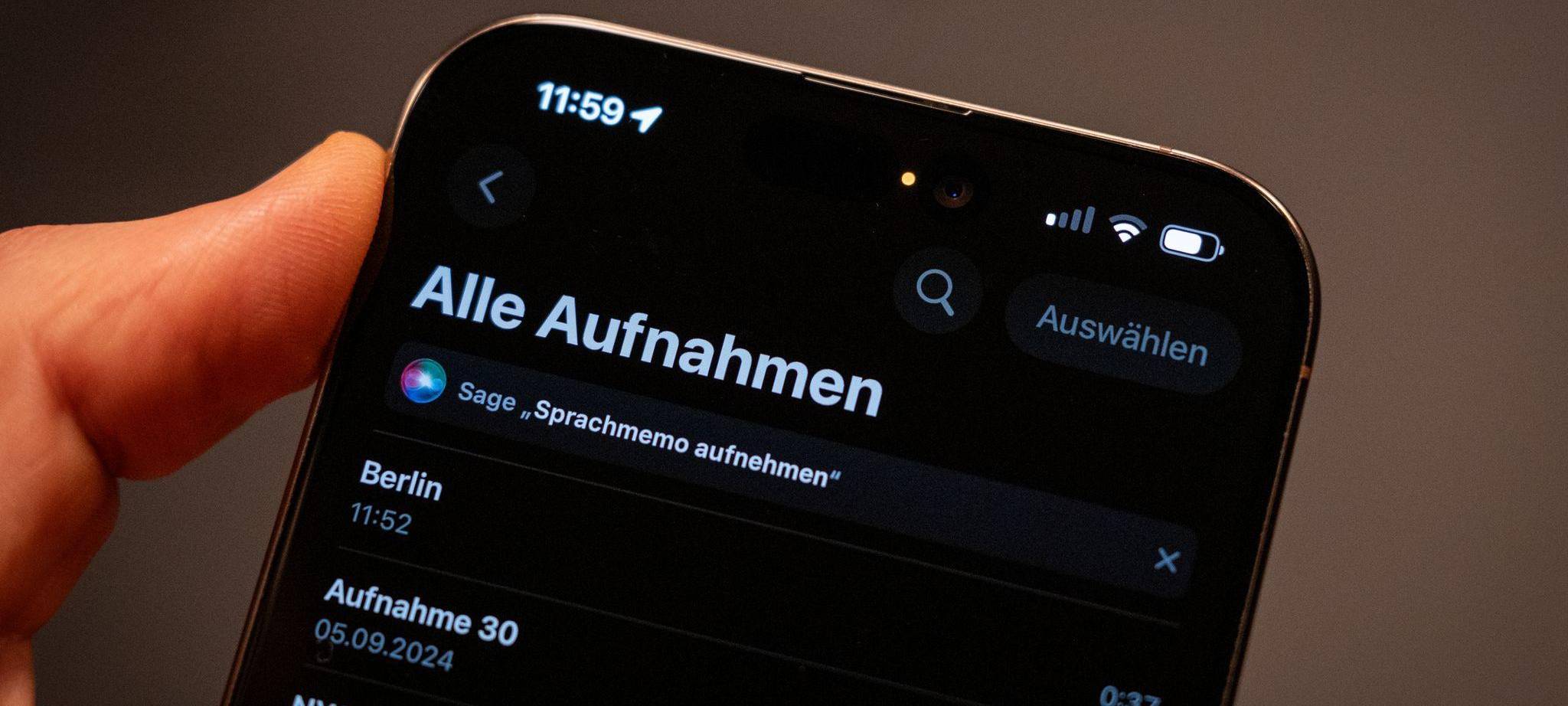 Eine orangefarbene Statusanzeige eines iPhones